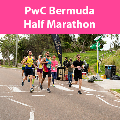 A group of marathon and half marathon runners travel along South Shore Road in Bermuda